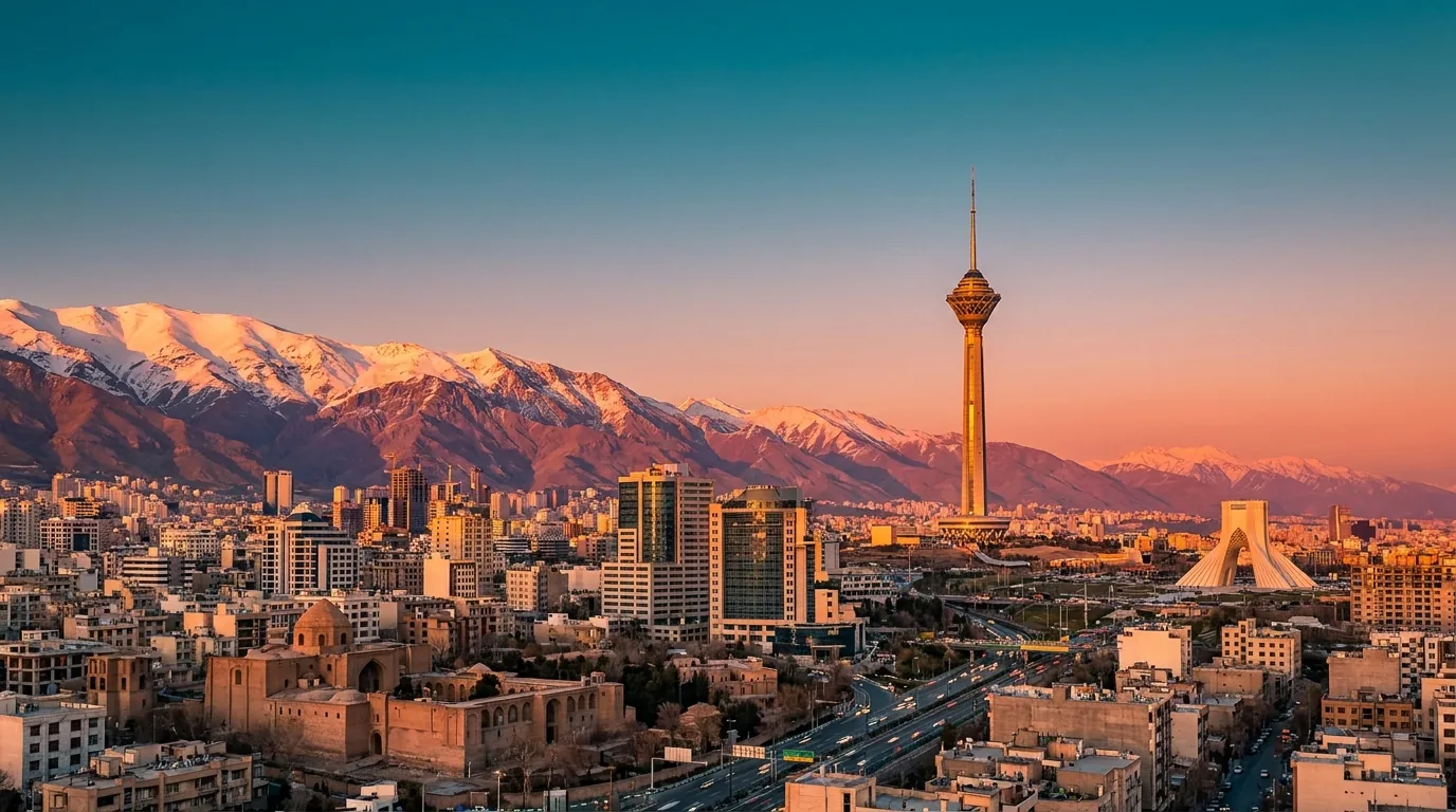 Golden-hour view of Tehran with the Alborz mountains